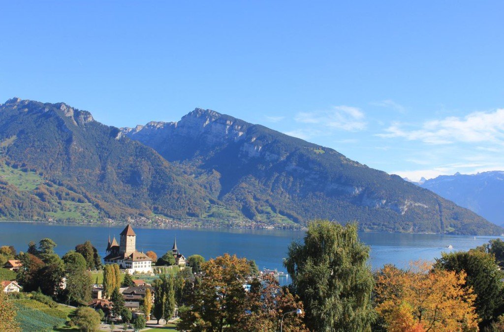 View of Castle in Spiez with Lake of Thun in the background