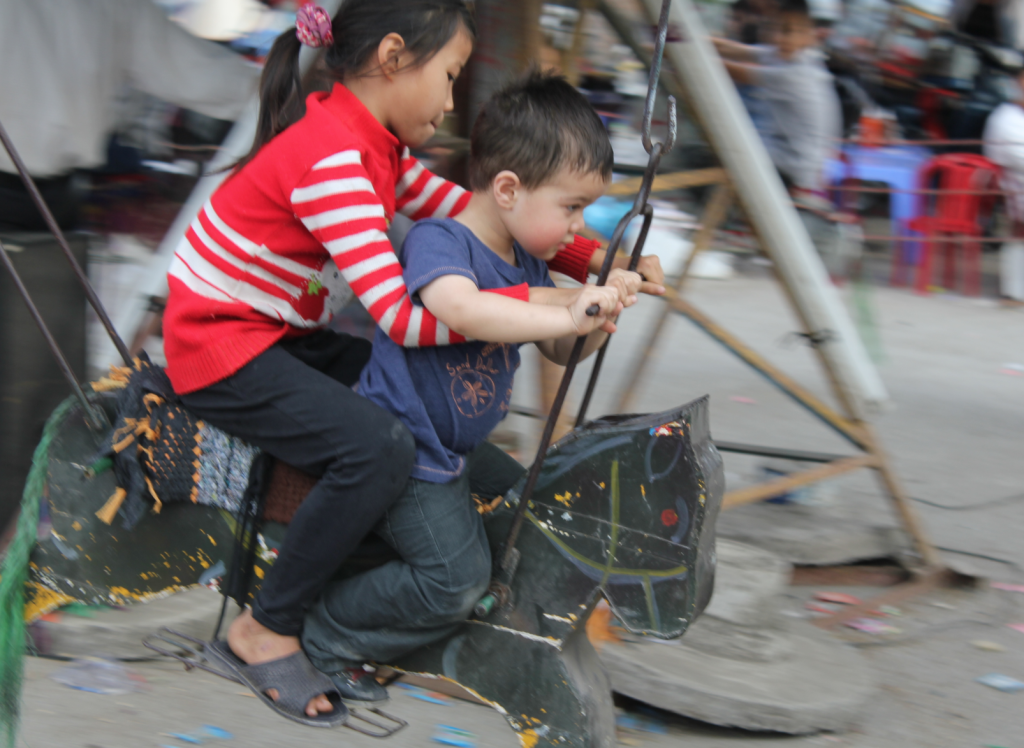 Lukas on Carrousel in Tam Cốc