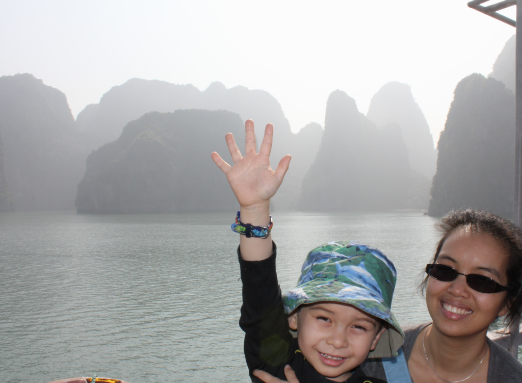 Anton waving from the boat